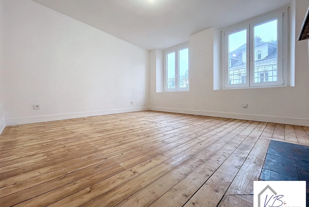 Immeuble mixte en vente à Bolbec avec local commercial et appartement rénovés 