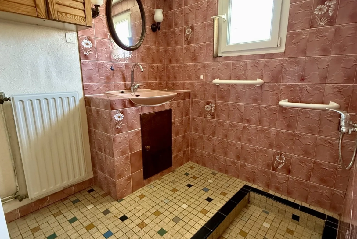 Maison à vendre à Rezé avec jardin et garage - 2 chambres, 65 m² 