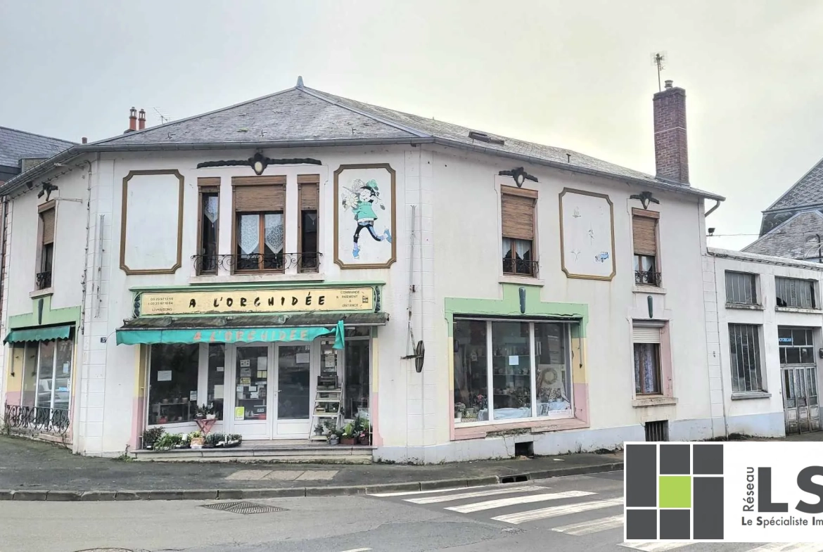 Immeuble mixte avec local commercial et habitation au centre du Nouvion-en-Thiérache 