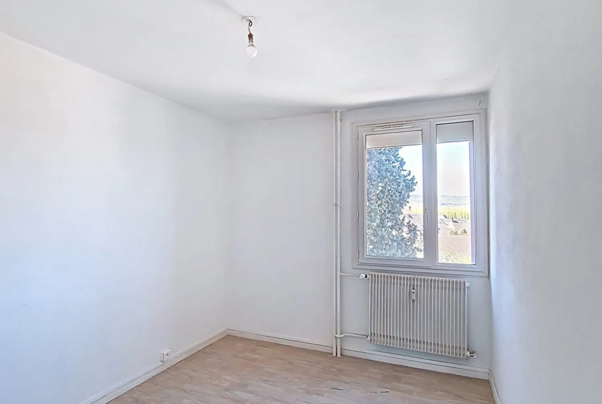 Appartement à vendre à Chagny avec balcon et cave - Idéal 2 chambres 