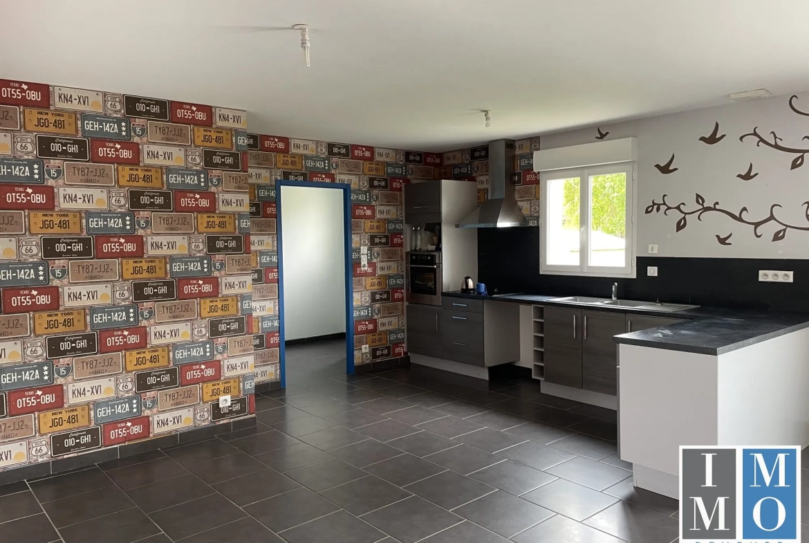 Maison plain-pied de 104m² à Bourges avec jardin et garage 