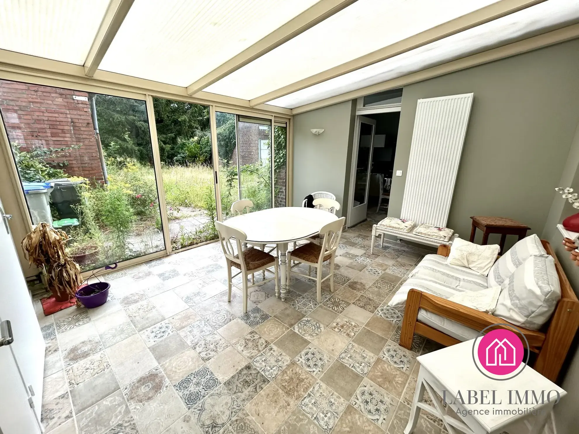 Maison 2 chambres à Aniche avec jardin, combles aménageables et dépendance 