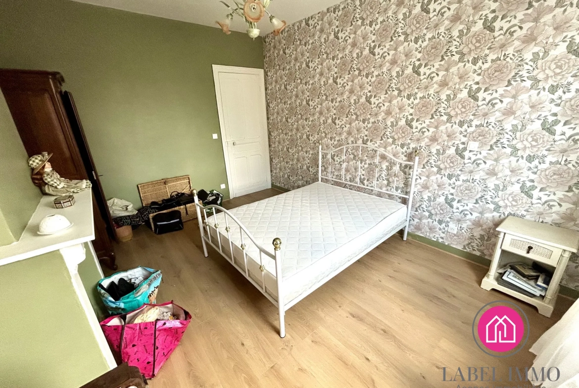 Maison 2 chambres à Aniche avec jardin, combles aménageables et dépendance 