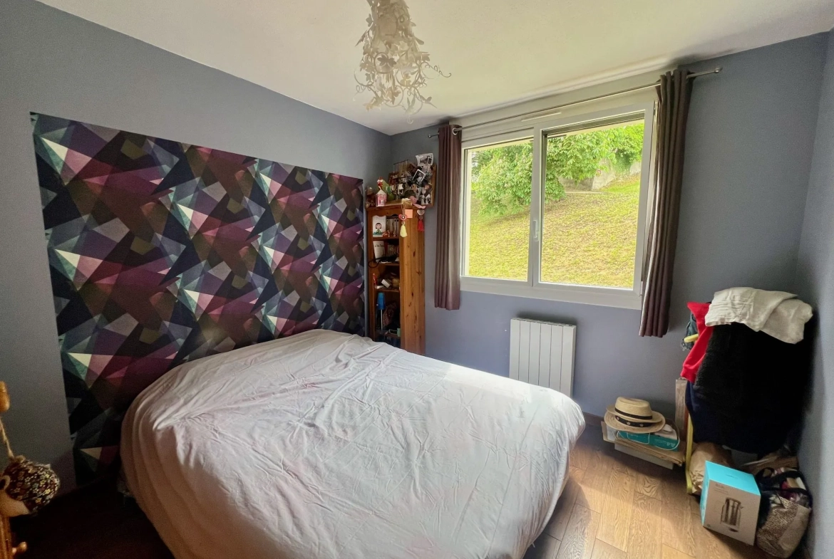 Appartement T4 à vendre à Saint-Priest-en-Jarez avec terrasse et garage 
