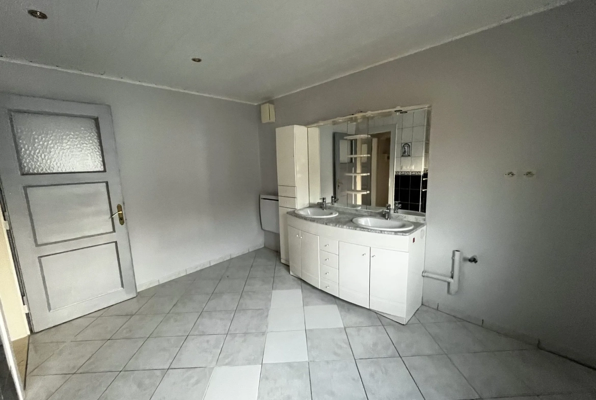 Maison à Zinswiller avec deux appartements et potentiel d'agrandissement 