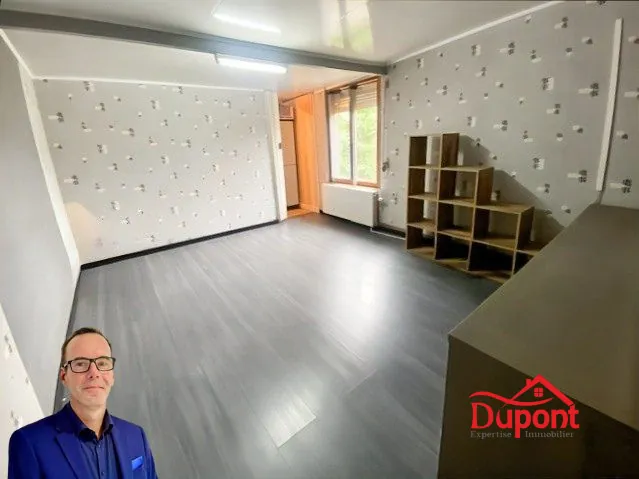 Maison à vendre à Quievrechain avec jardin et garage - 113 m² 