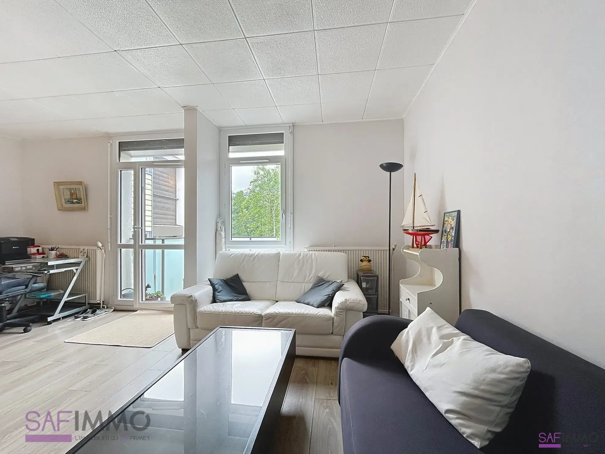 Appartement T4 lumineux à vendre à Oullins, rénové, avec balcon et cave dans environnement verdoyant 