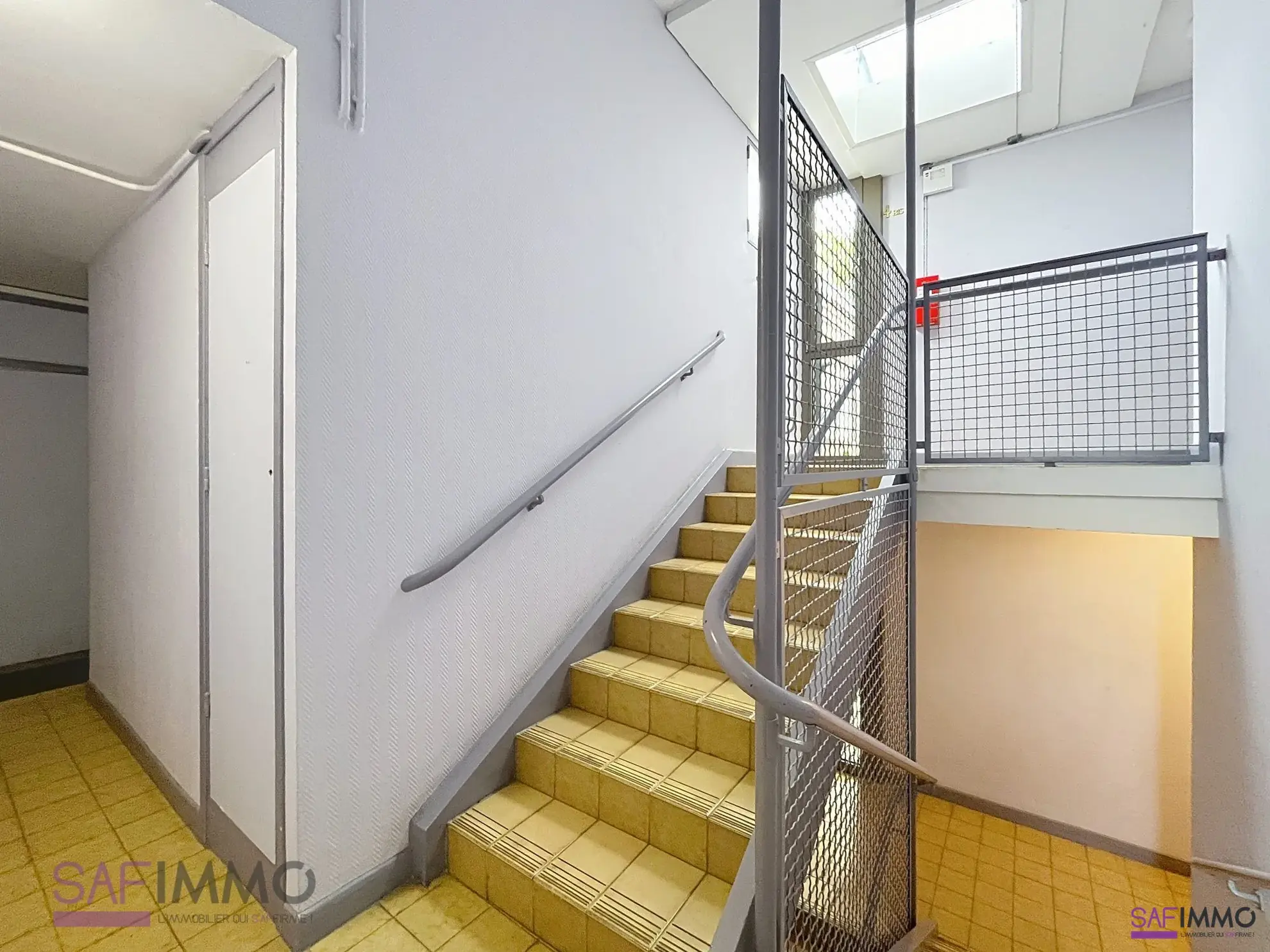 Appartement T4 lumineux à vendre à Oullins, rénové, avec balcon et cave dans environnement verdoyant 