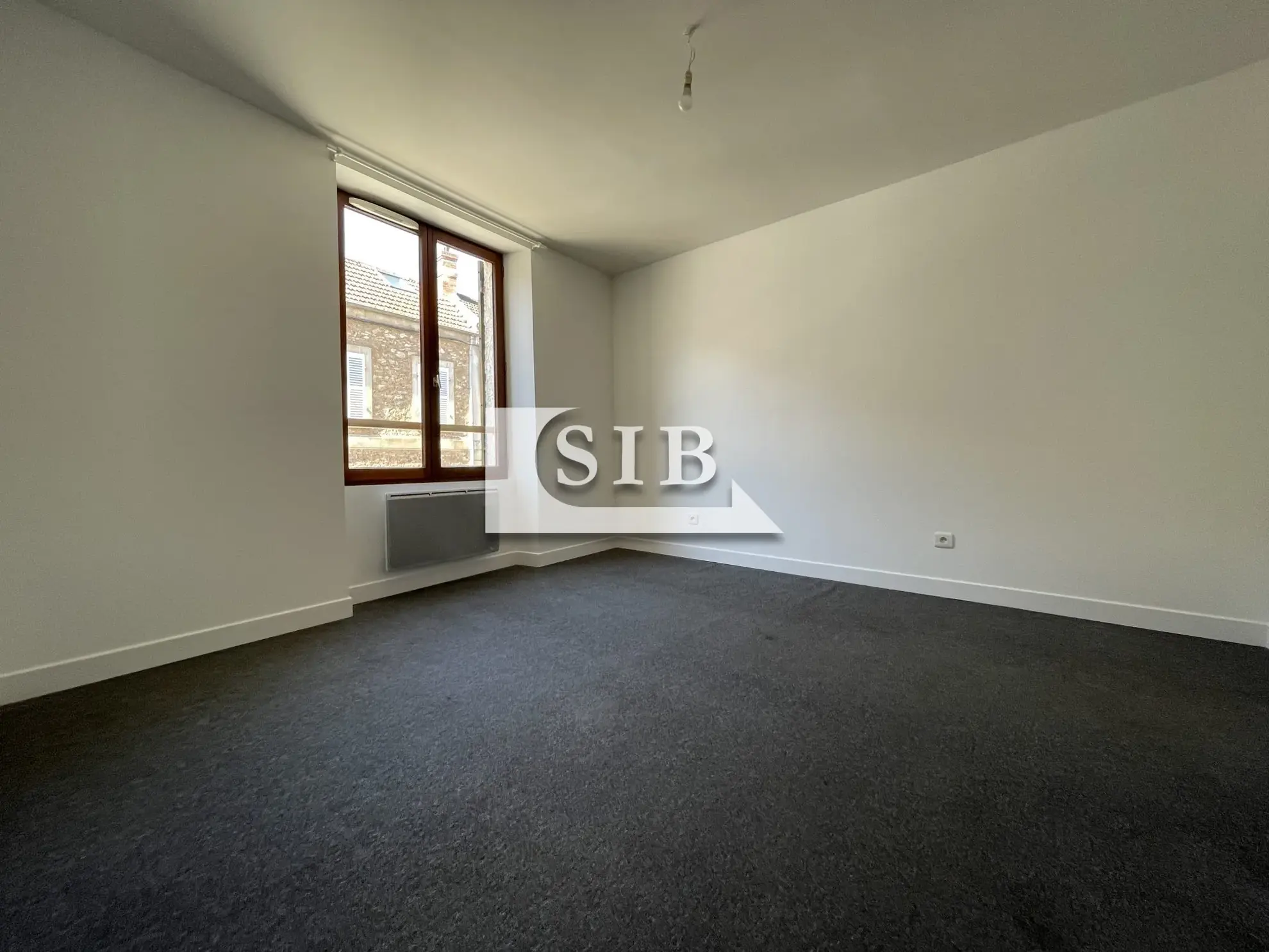 Appartement 2 pièces à vendre à La Ville-du-Bois, rénové et loué 