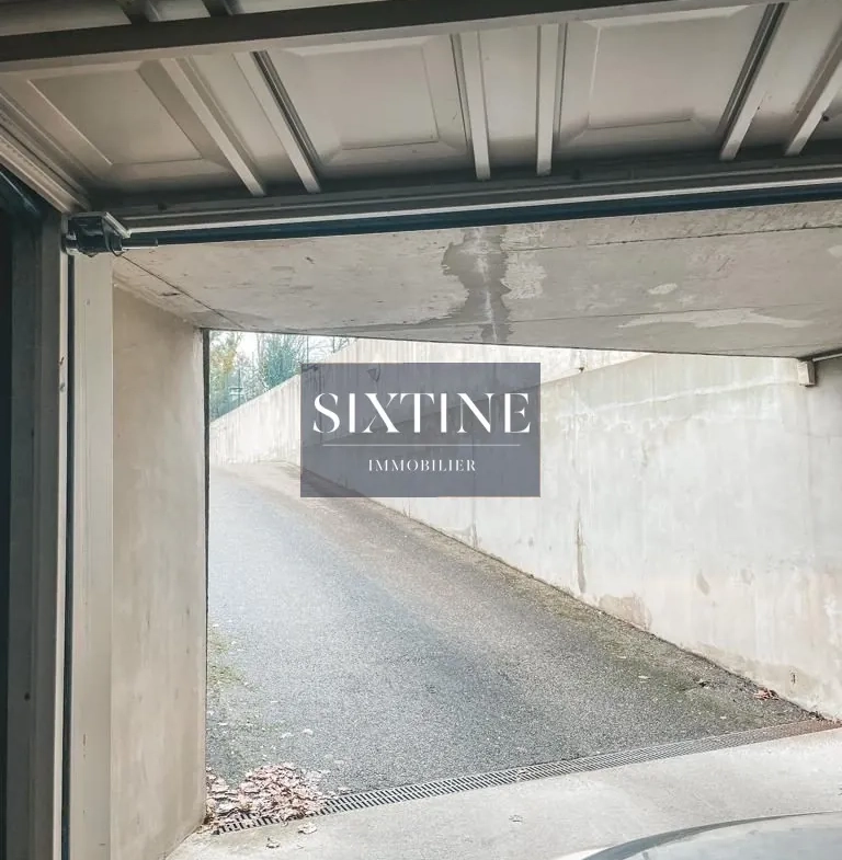 Garage en location à Bourgoin-Jallieu dans résidence sécurisée 