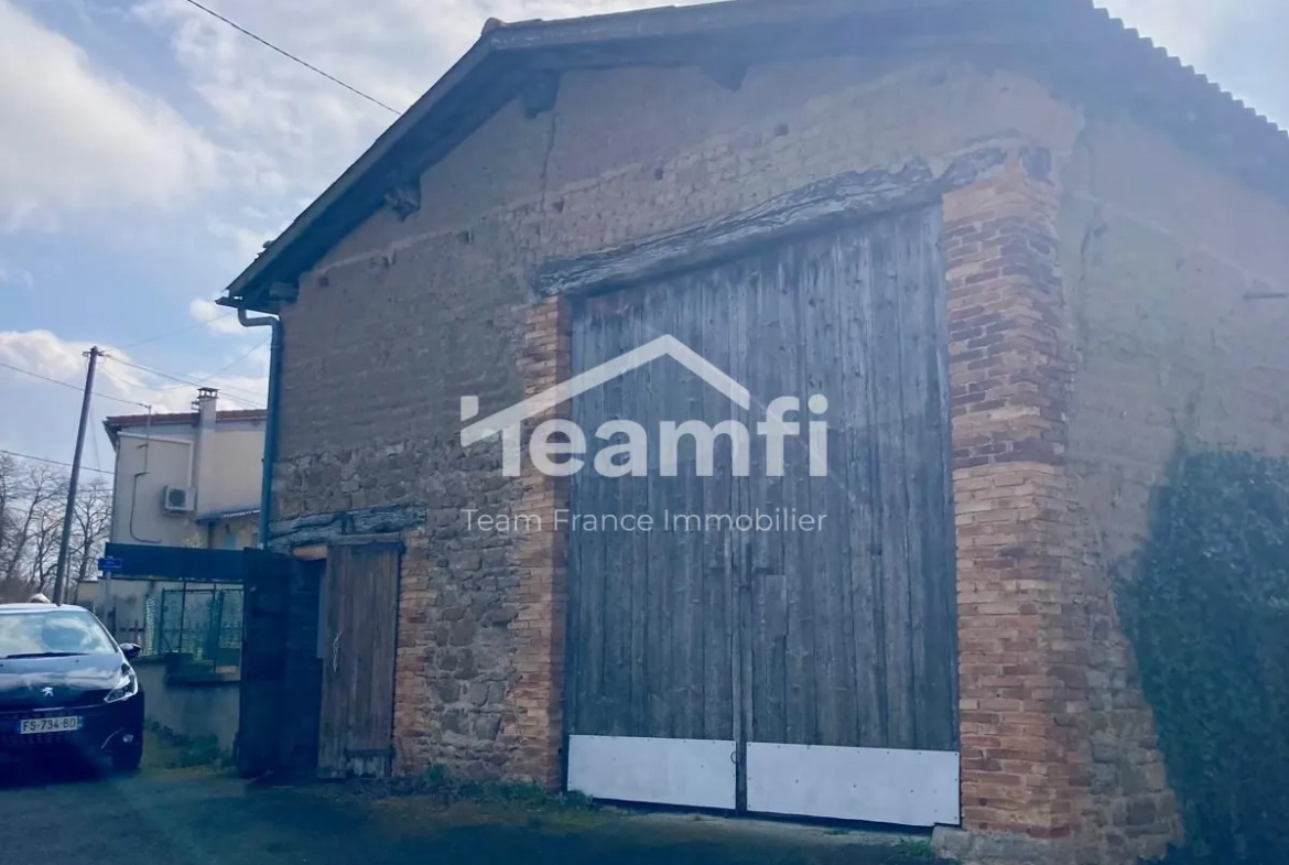Maison de 71 m² à Lezoux avec deux granges et potentiel d'investissement 