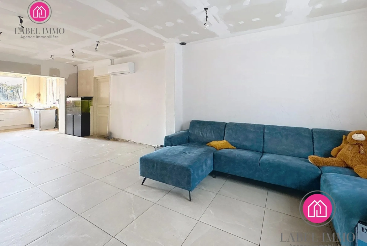 Maison semi-individuelle à vendre à Condé-sur-l'Escaut avec garage et jardin 