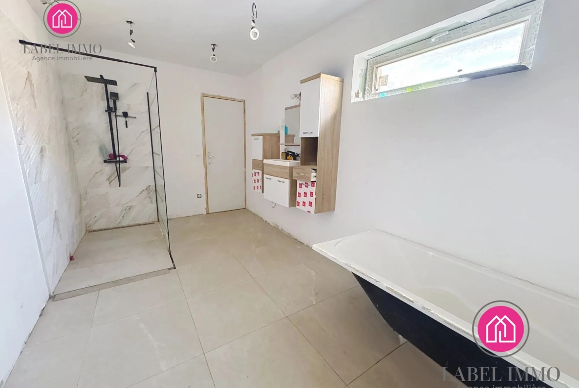 Maison semi-individuelle à vendre à Condé-sur-l'Escaut avec garage et jardin 