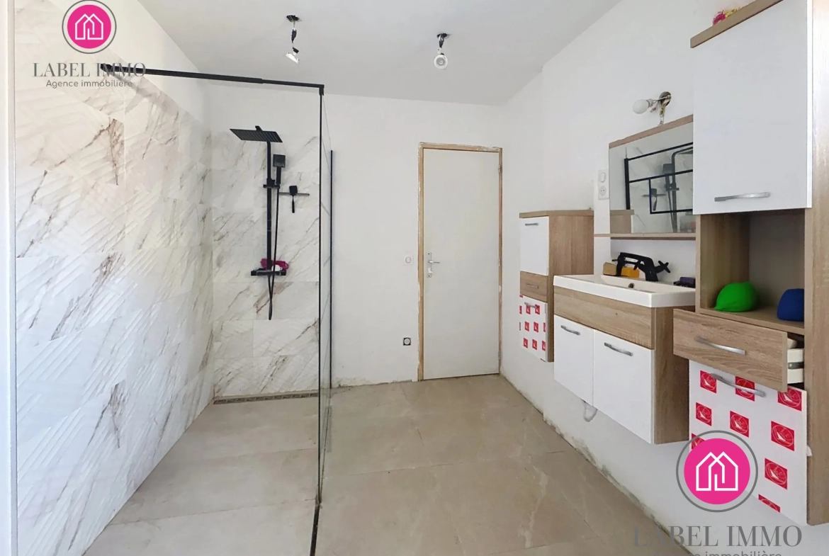 Maison semi-individuelle à vendre à Condé-sur-l'Escaut avec garage et jardin 