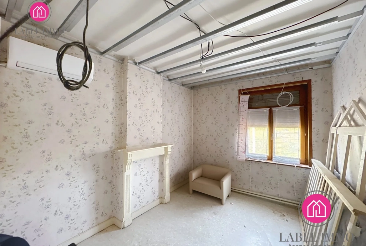Maison semi-individuelle à vendre à Condé-sur-l'Escaut avec garage et jardin 