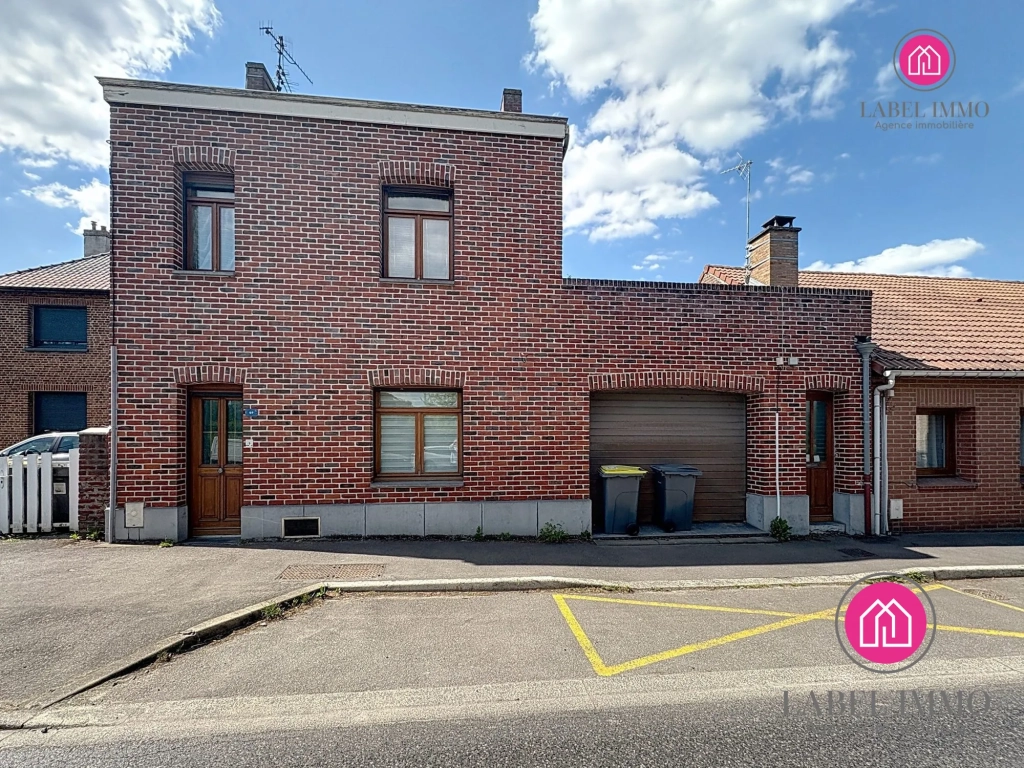 Maison semi-individuelle à vendre à Condé-sur-l'Escaut avec garage et jardin