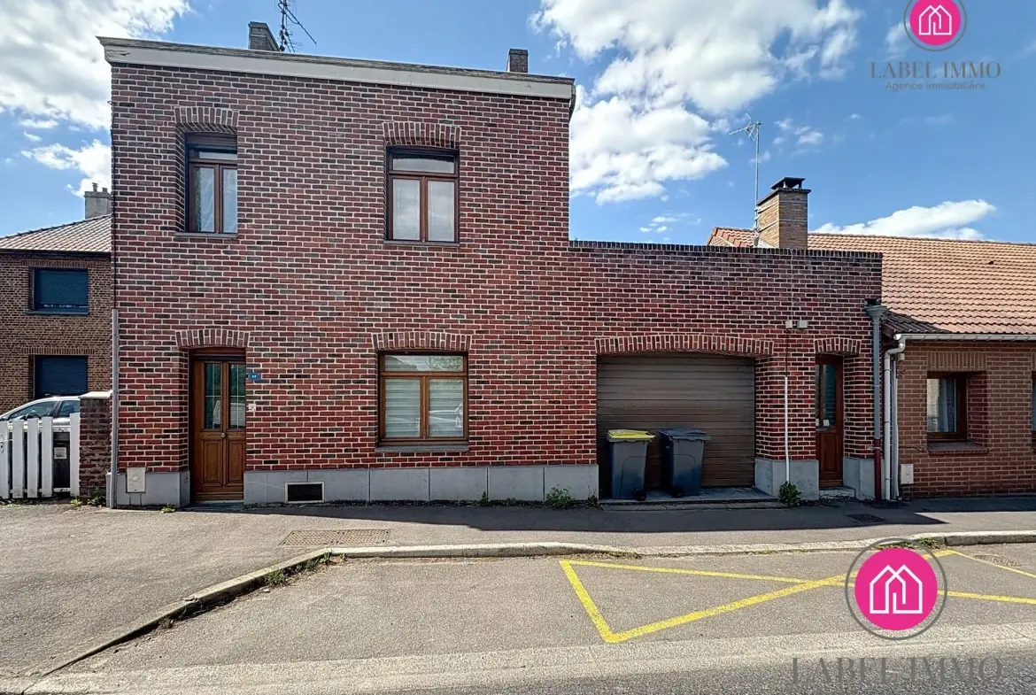 Maison semi-individuelle à vendre à Condé-sur-l'Escaut avec garage et jardin 
