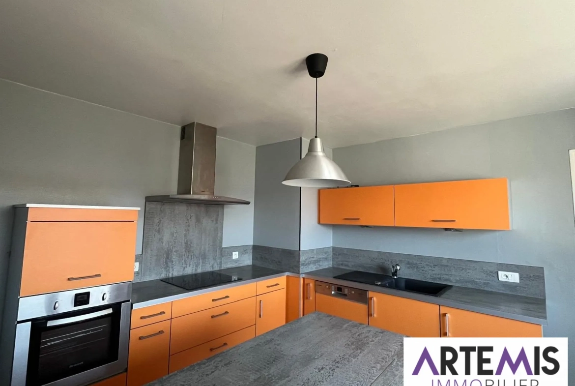 Bel appartement de plain-pied au centre de Saône avec garage et faibles charges 