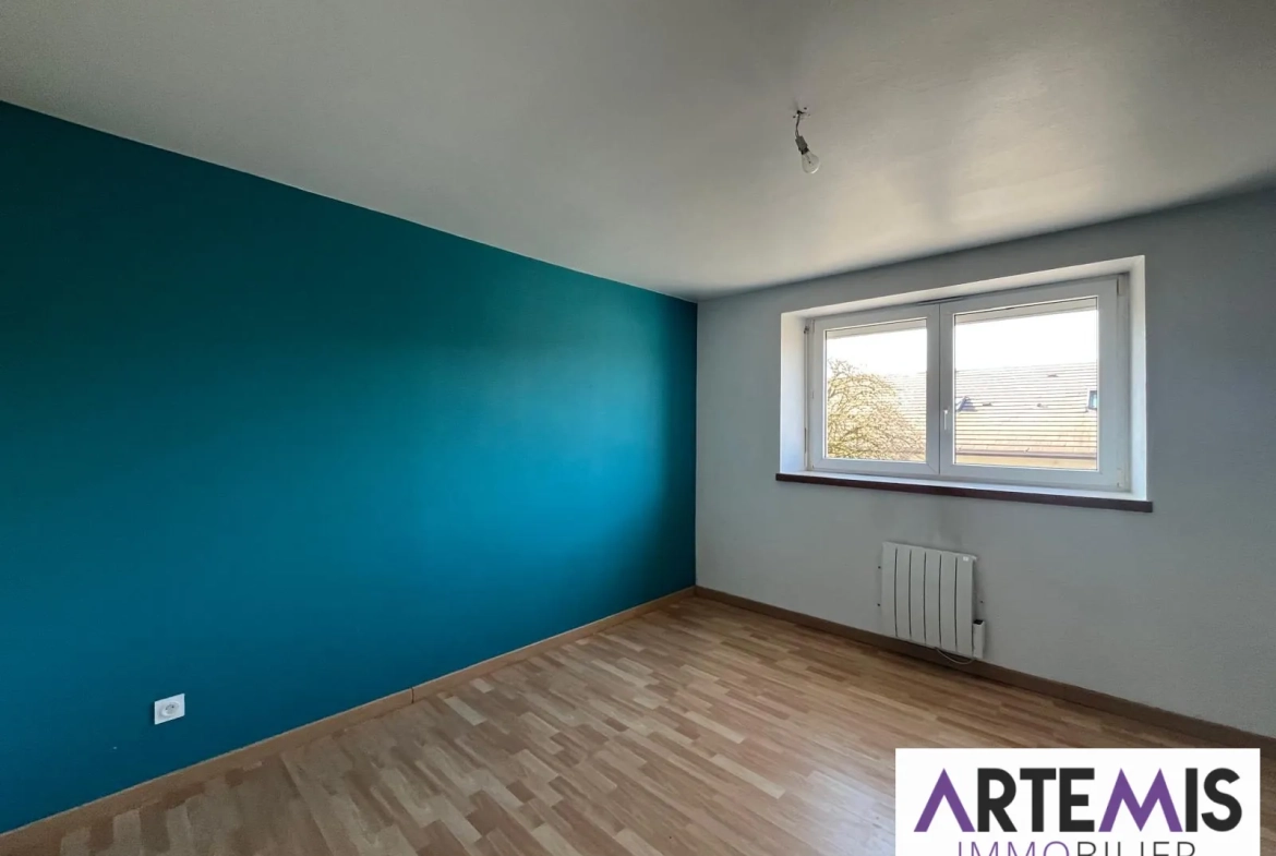 Bel appartement de plain-pied au centre de Saône avec garage et faibles charges 