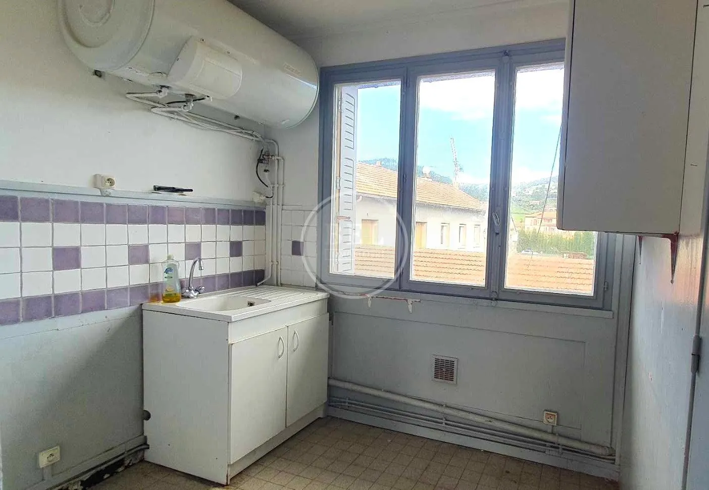 Appartement duplex à Sainte Foy l'Argentière avec terrain et potentiel de rénovation 