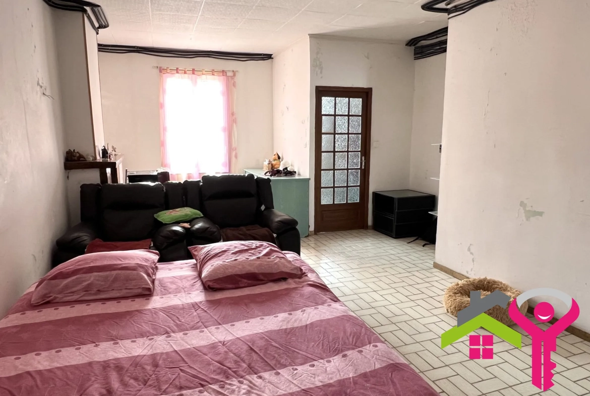 Maison mitoyenne lumineuse à Denain avec jardin et 2 chambres 