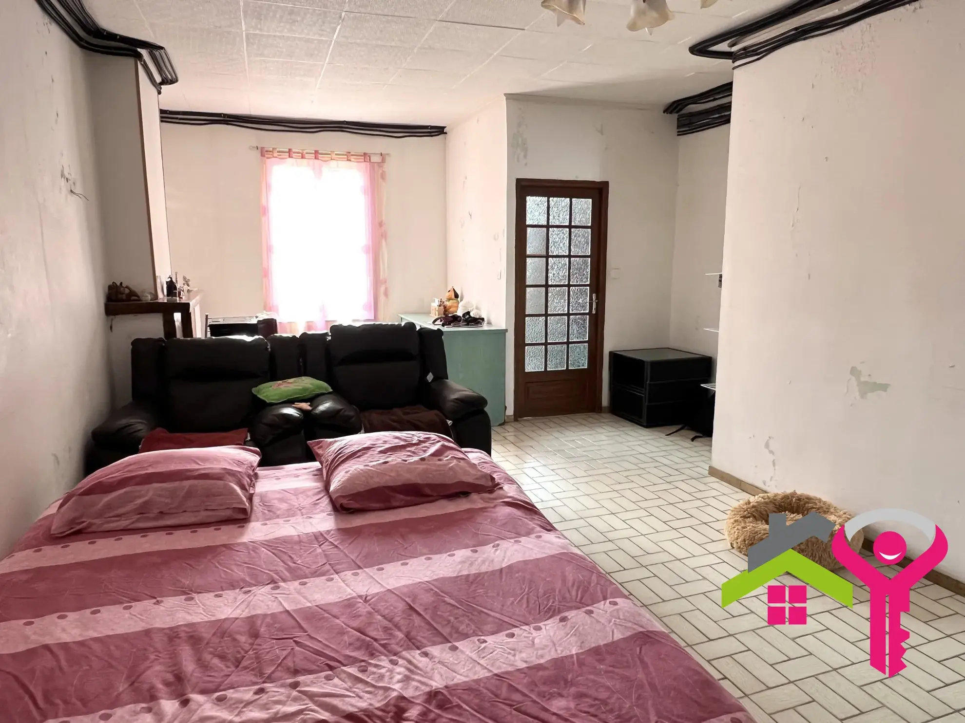 Maison mitoyenne lumineuse à Denain avec jardin et 2 chambres 