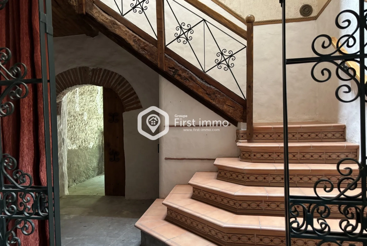 Maison de caractère avec cour intérieure, terrasse et potentiel touristique à Ille-sur-Têt 
