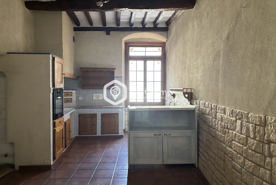 Maison de caractère avec cour intérieure, terrasse et potentiel touristique à Ille-sur-Têt 