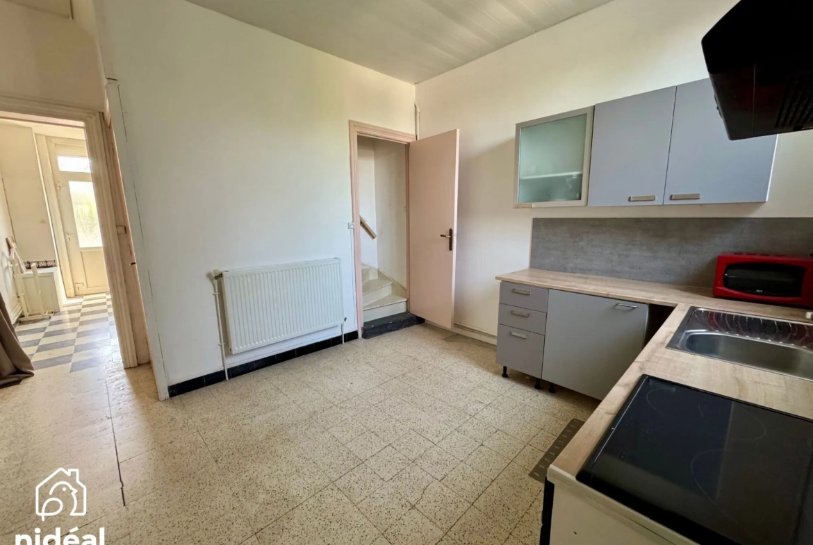 Maison mitoyenne à Rousies avec 3 chambres et cave - Bien à découvrir 