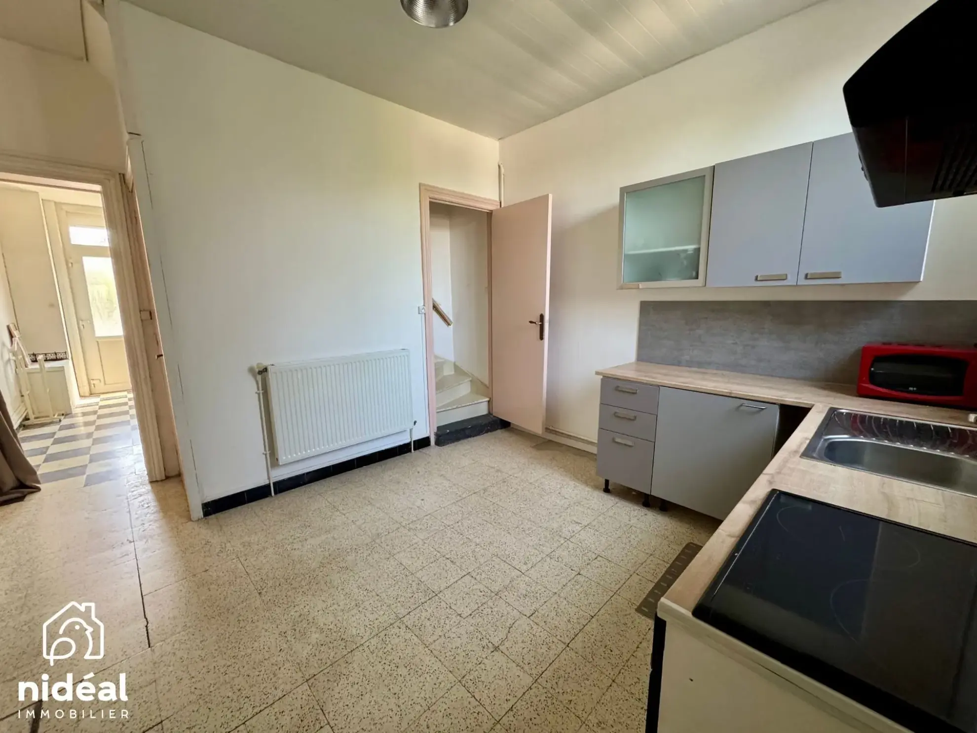 Maison mitoyenne à Rousies avec 3 chambres et cave - Bien à découvrir 