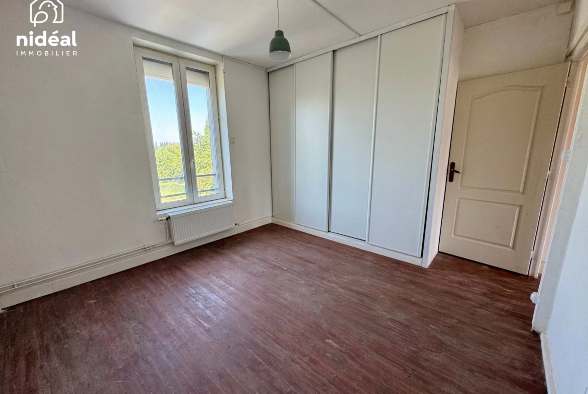 Maison mitoyenne à Rousies avec 3 chambres et cave - Bien à découvrir 