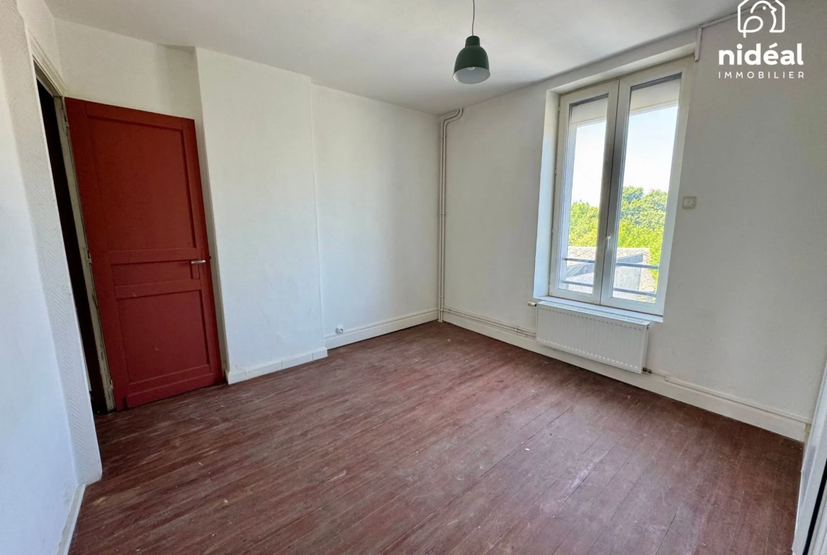 Maison mitoyenne à Rousies avec 3 chambres et cave - Bien à découvrir 