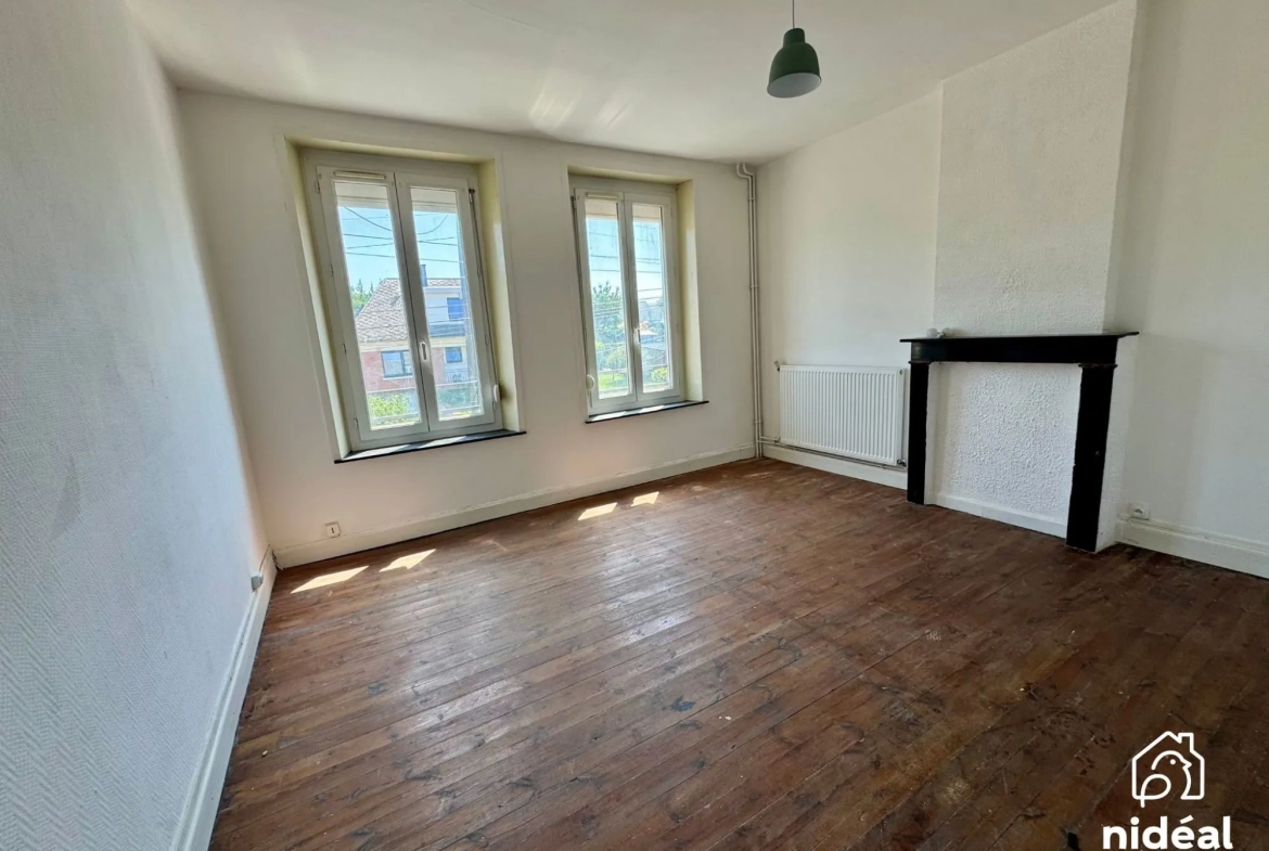 Maison mitoyenne à Rousies avec 3 chambres et cave - Bien à découvrir 