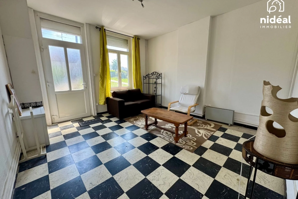 Maison mitoyenne à Rousies avec 3 chambres et cave - Bien à découvrir 