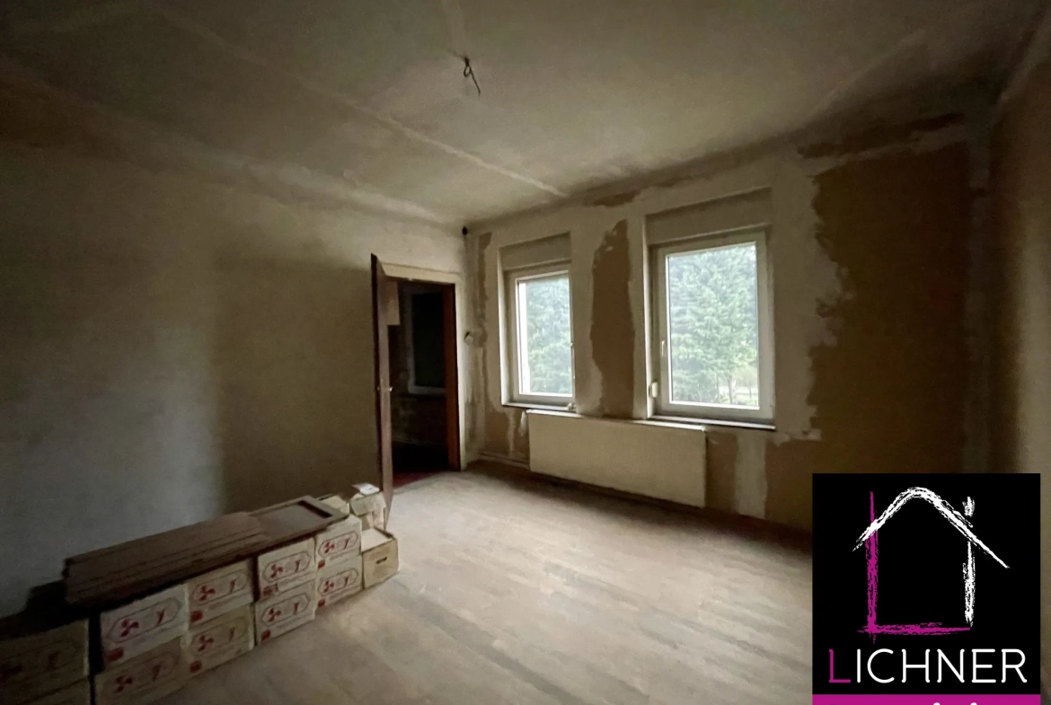 Maison à rénover de 176 m² avec 6 chambres et jardin à L'Hôpital 