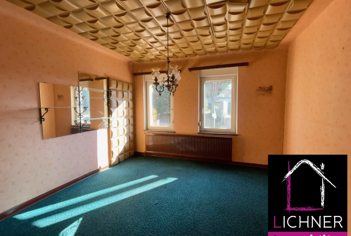 Maison à rénover de 176 m² avec 6 chambres et jardin à L'Hôpital 