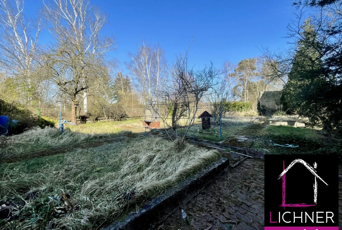 Maison à rénover de 176 m² avec 6 chambres et jardin à L'Hôpital 