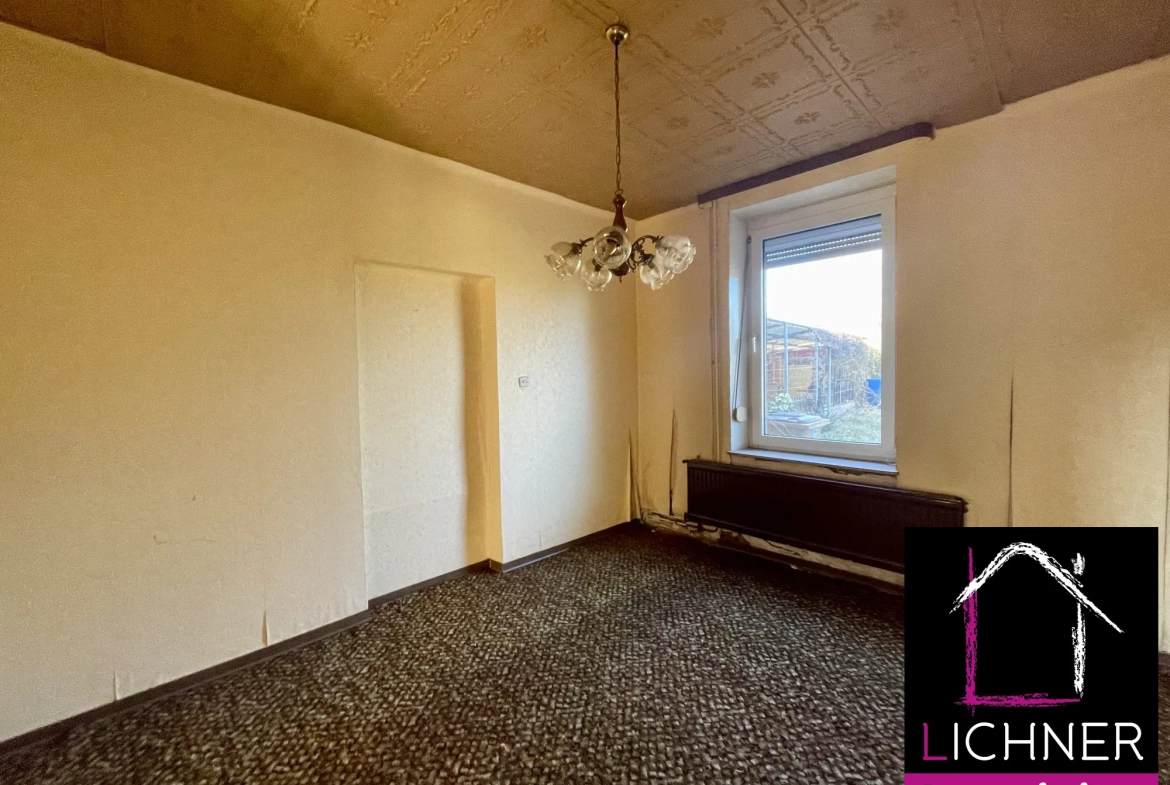Maison à rénover de 176 m² avec 6 chambres et jardin à L'Hôpital 