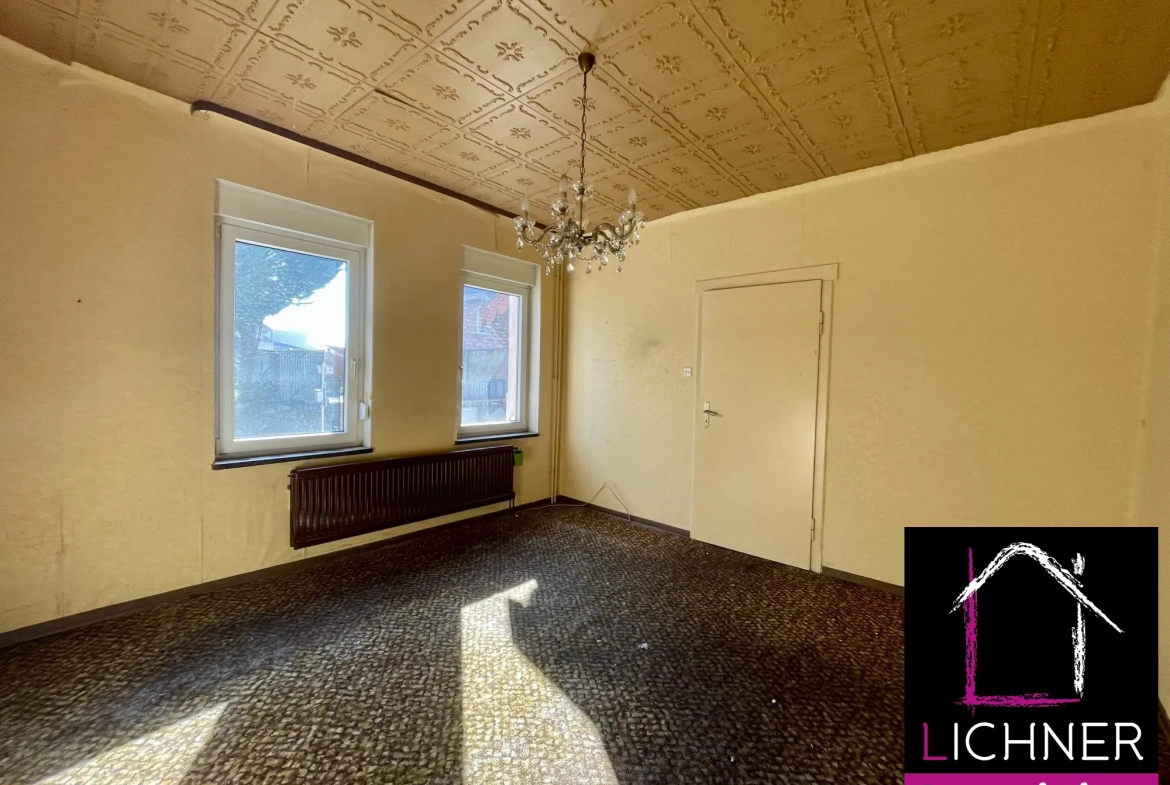 Maison à rénover de 176 m² avec 6 chambres et jardin à L'Hôpital 