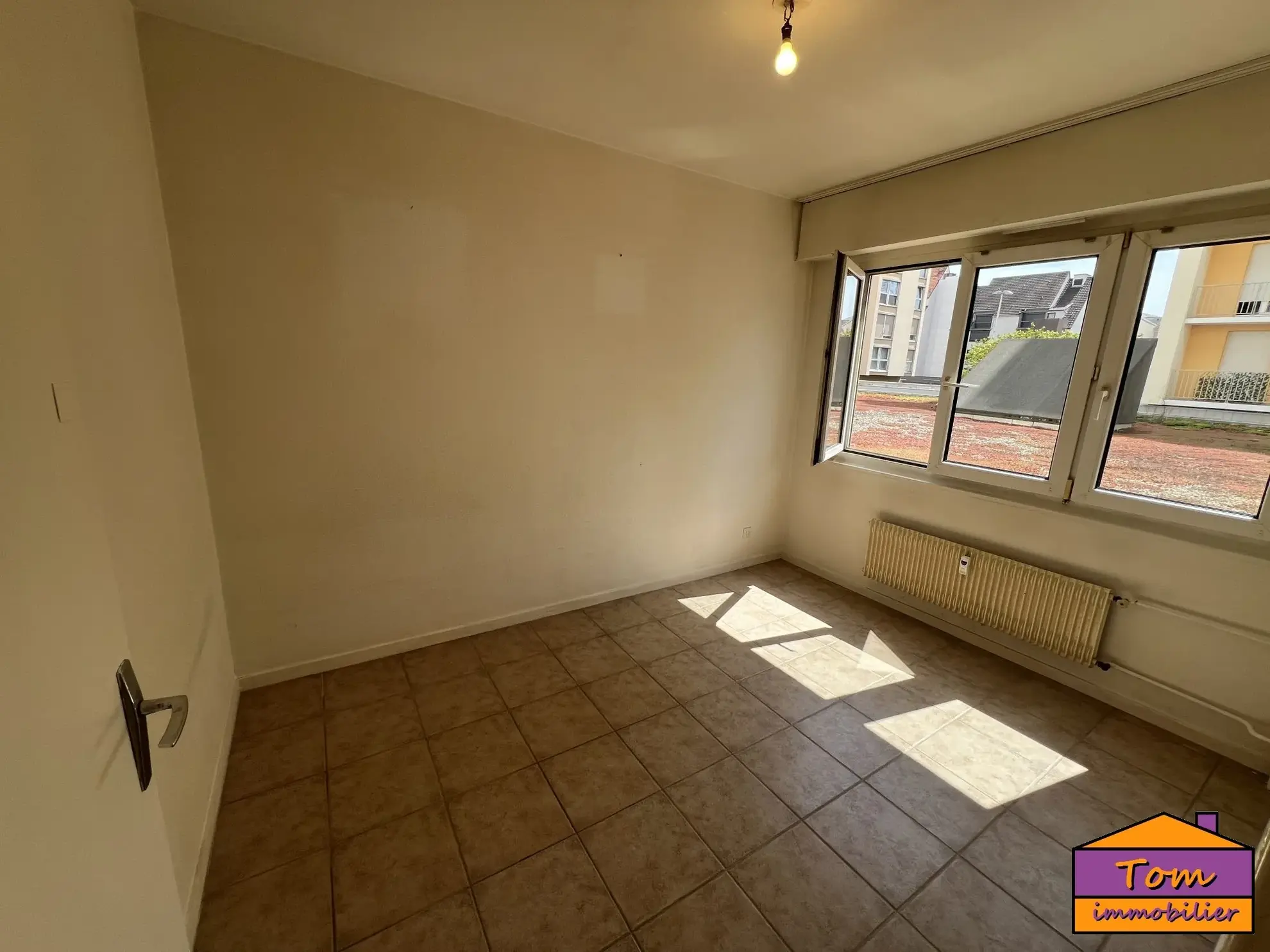 Appartement 3 pièces à vendre à Colmar - 76 m² avec balcon et garage 