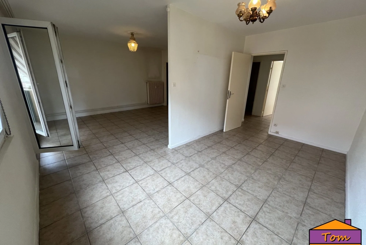 Appartement 3 pièces à vendre à Colmar - 76 m² avec balcon et garage 