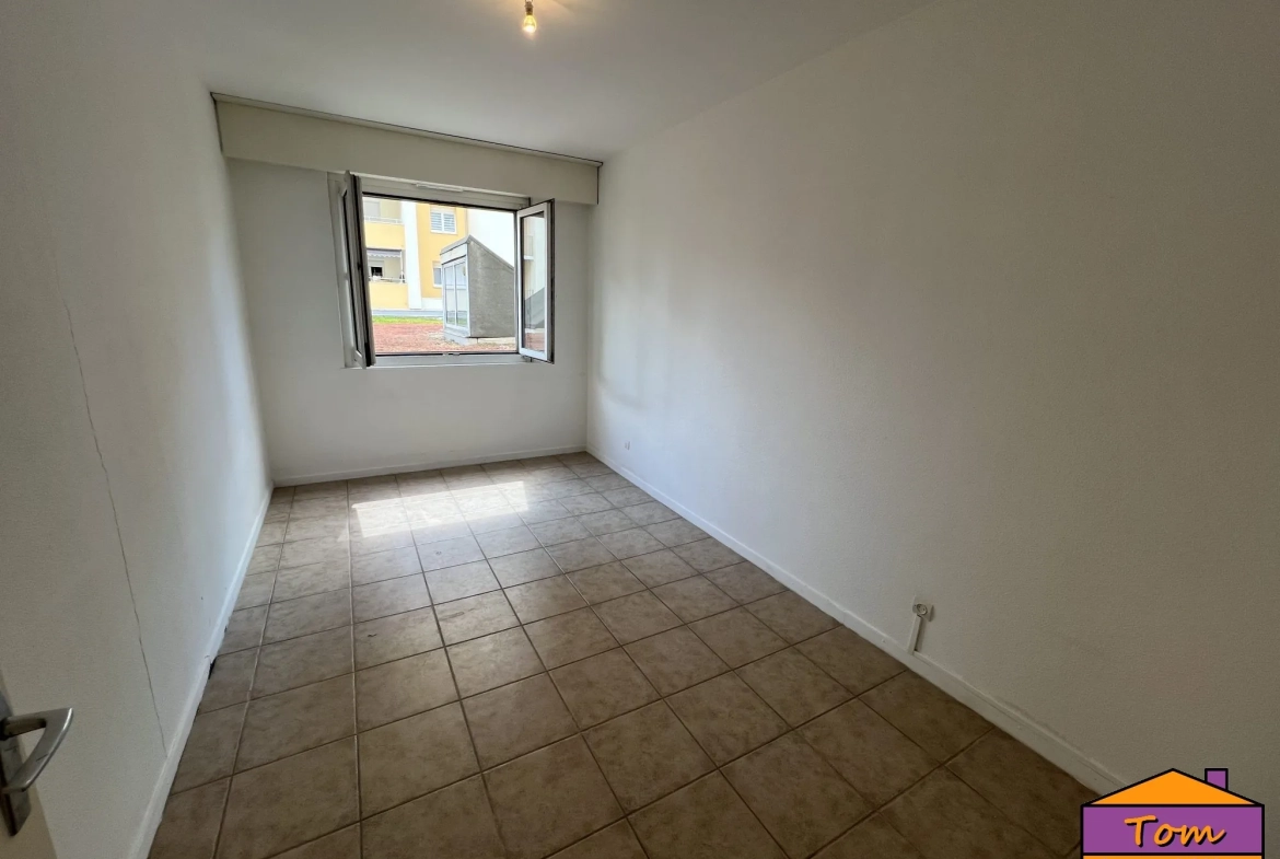 Appartement 3 pièces à vendre à Colmar - 76 m² avec balcon et garage 