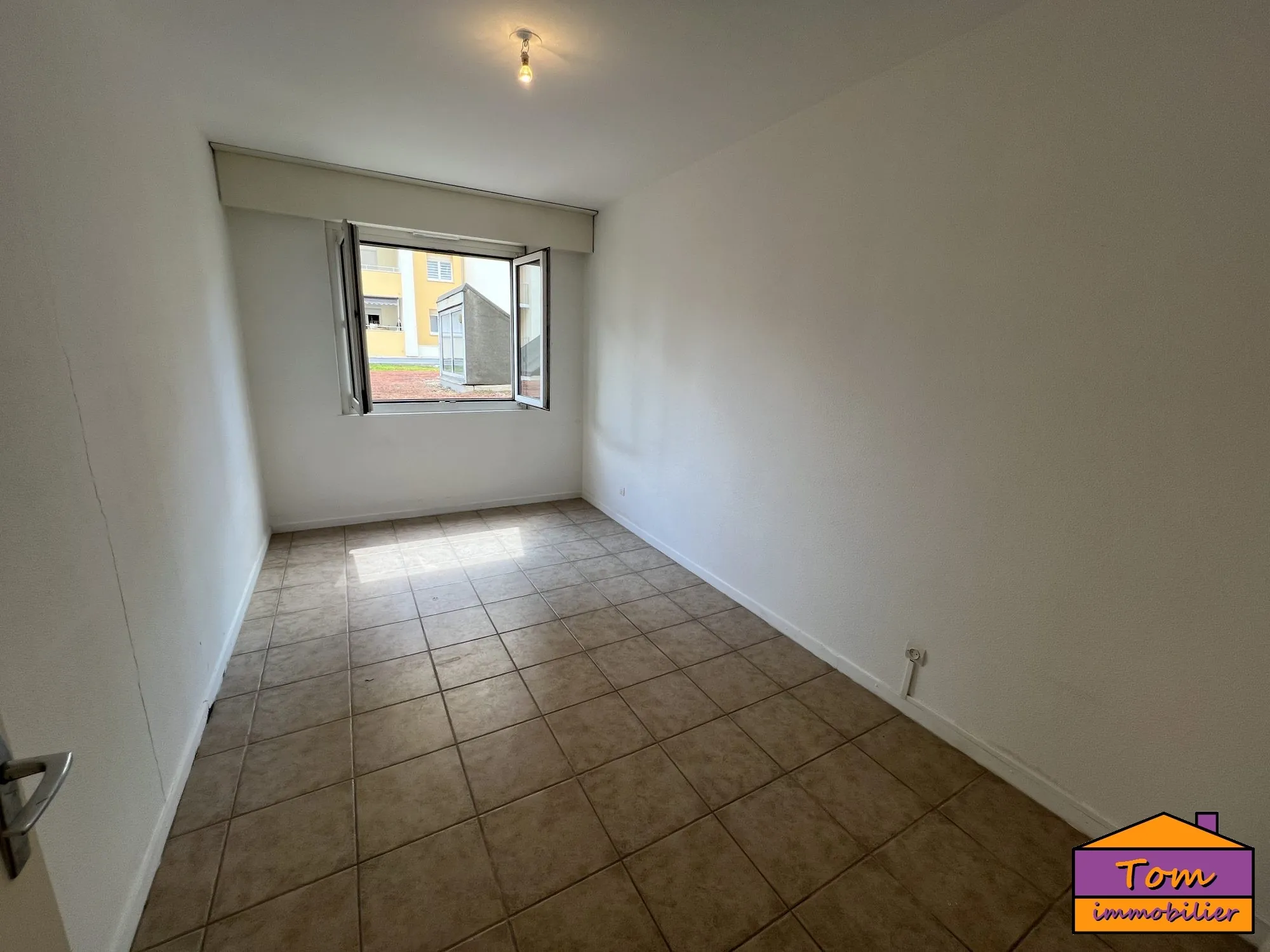 Appartement 3 pièces à vendre à Colmar - 76 m² avec balcon et garage 