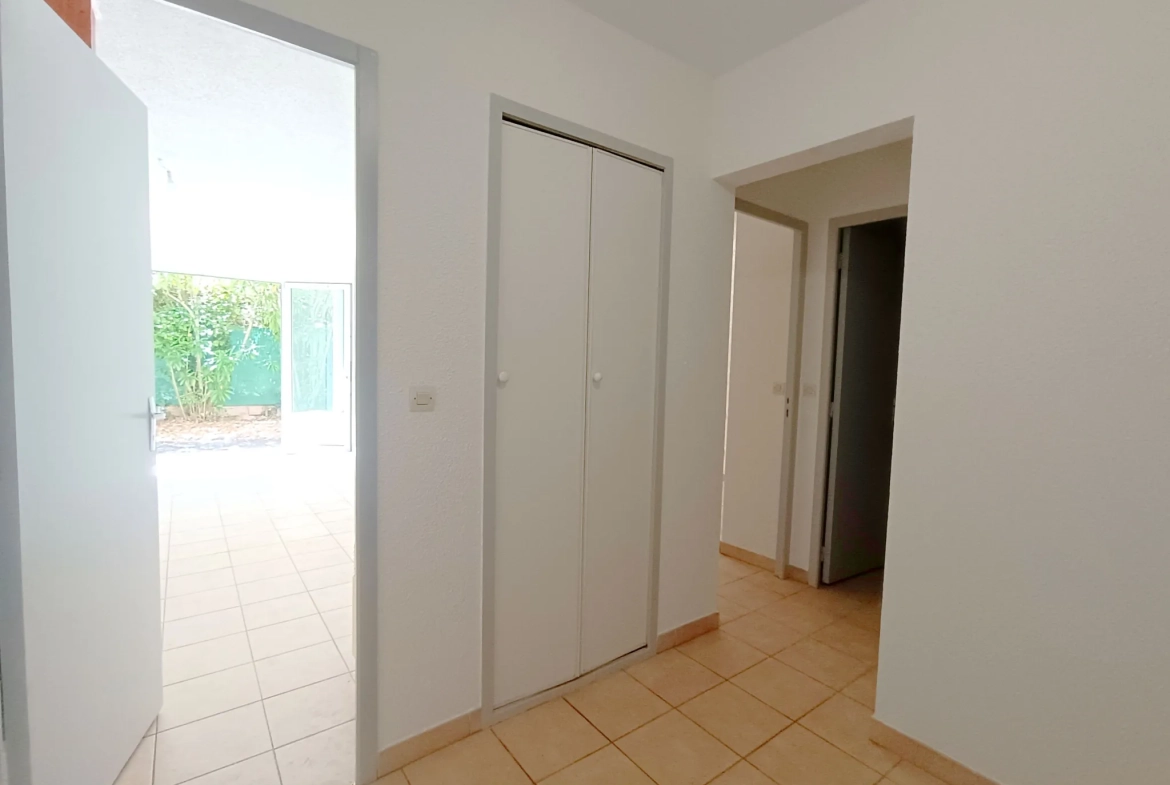Appartement T3 de plain-pied avec jardinet et garage à Carcassonne 