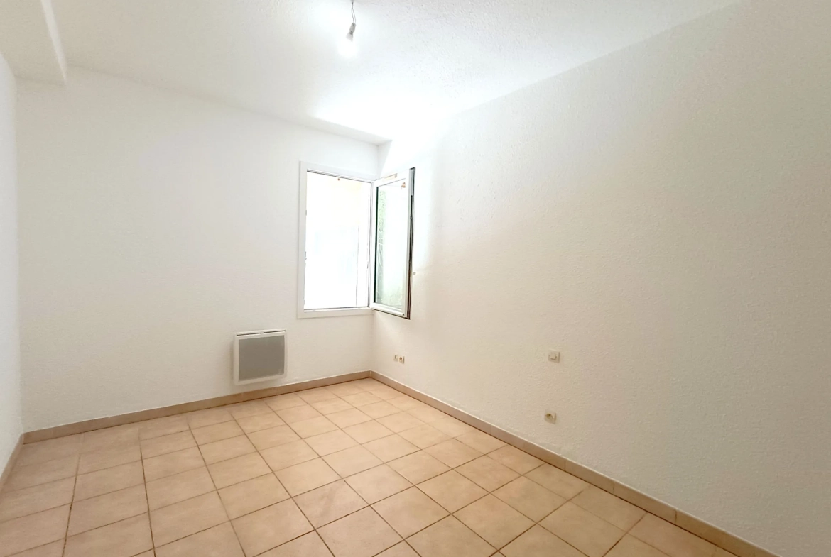 Appartement T3 de plain-pied avec jardinet et garage à Carcassonne 
