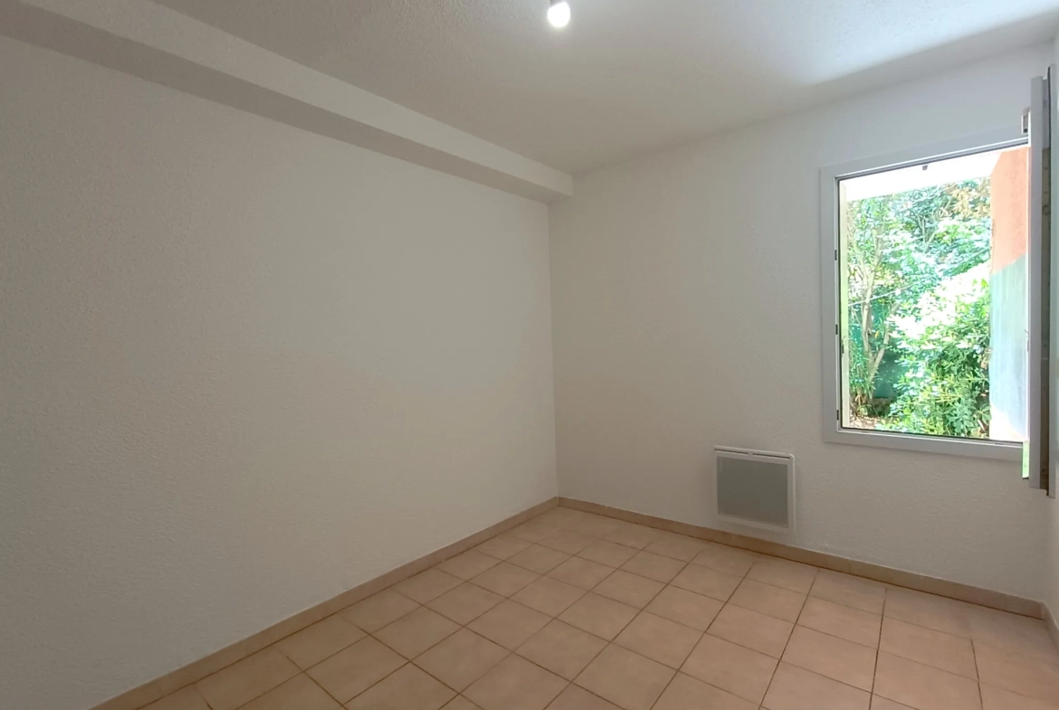 Appartement T3 de plain-pied avec jardinet et garage à Carcassonne 