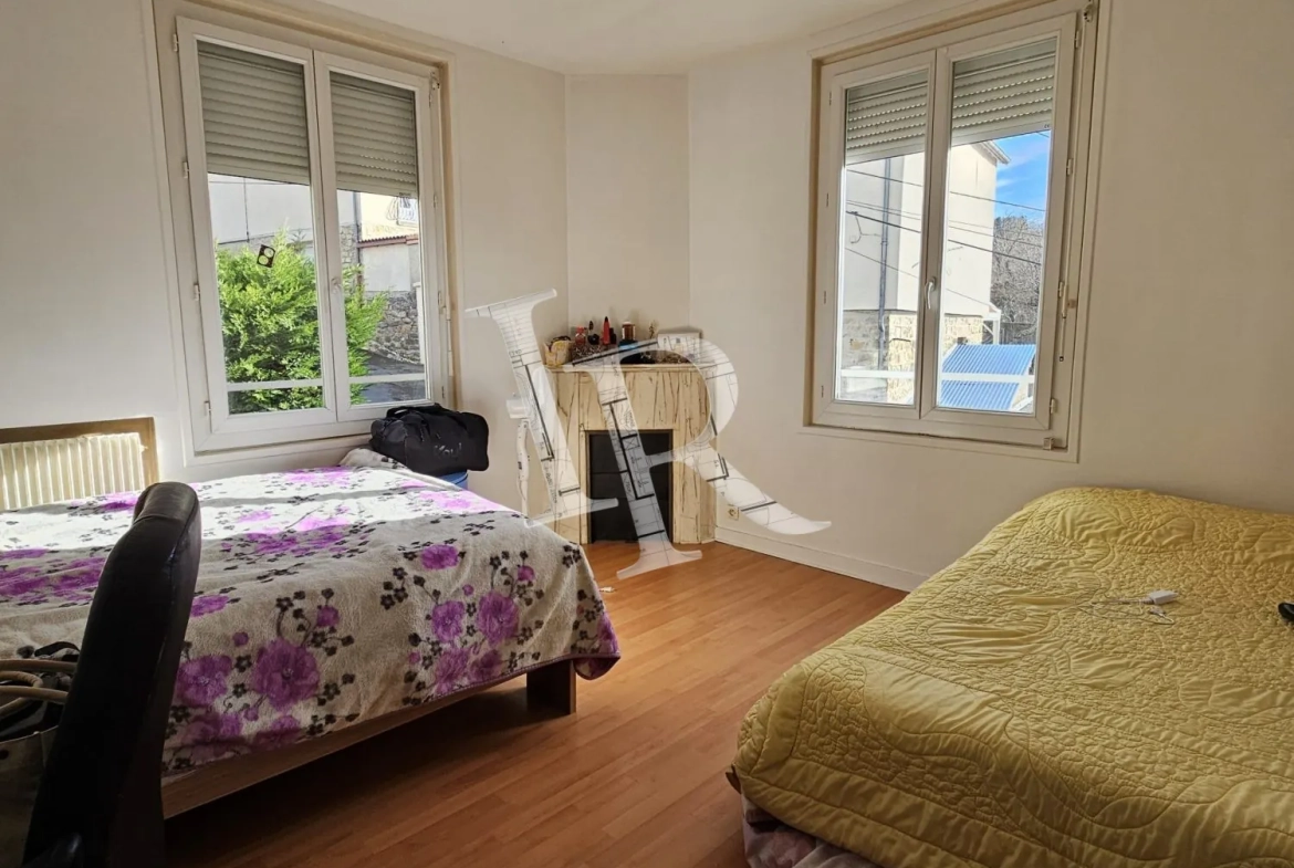 Immeuble à vendre au Puy-en-Velay – 4 appartements, caves et stationnements dans secteur calme 