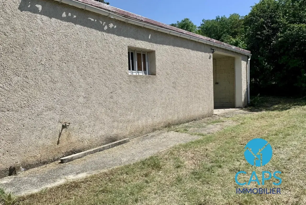 Terrain constructible à Douelle avec bâtisse et vue dégagée – Opportunité rare 
