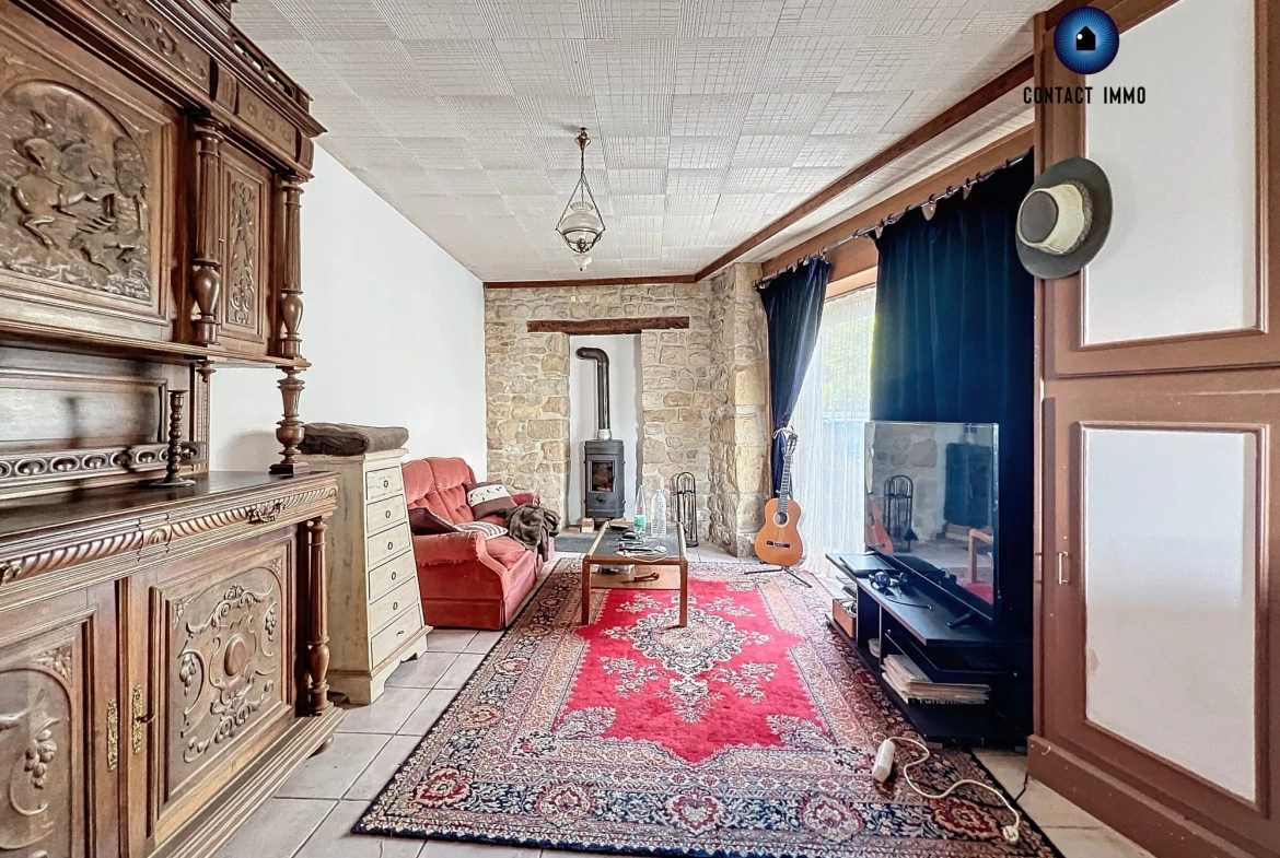Maison en pierre à Ayen avec potentiel locatif et travaux récents 
