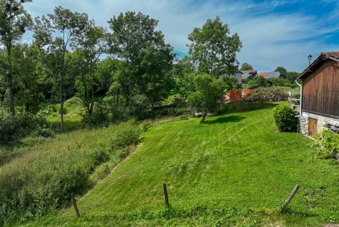 Terrain constructible de 485 m² à Thollon-les-Mémises, calme et ensoleillé 